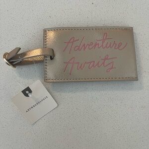 Anthropologie Gold Leather Luggage Tag